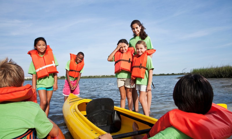 Kids at a summer camp by the water
