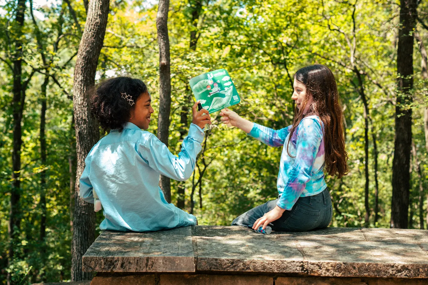 Children working on a craft project together at a table